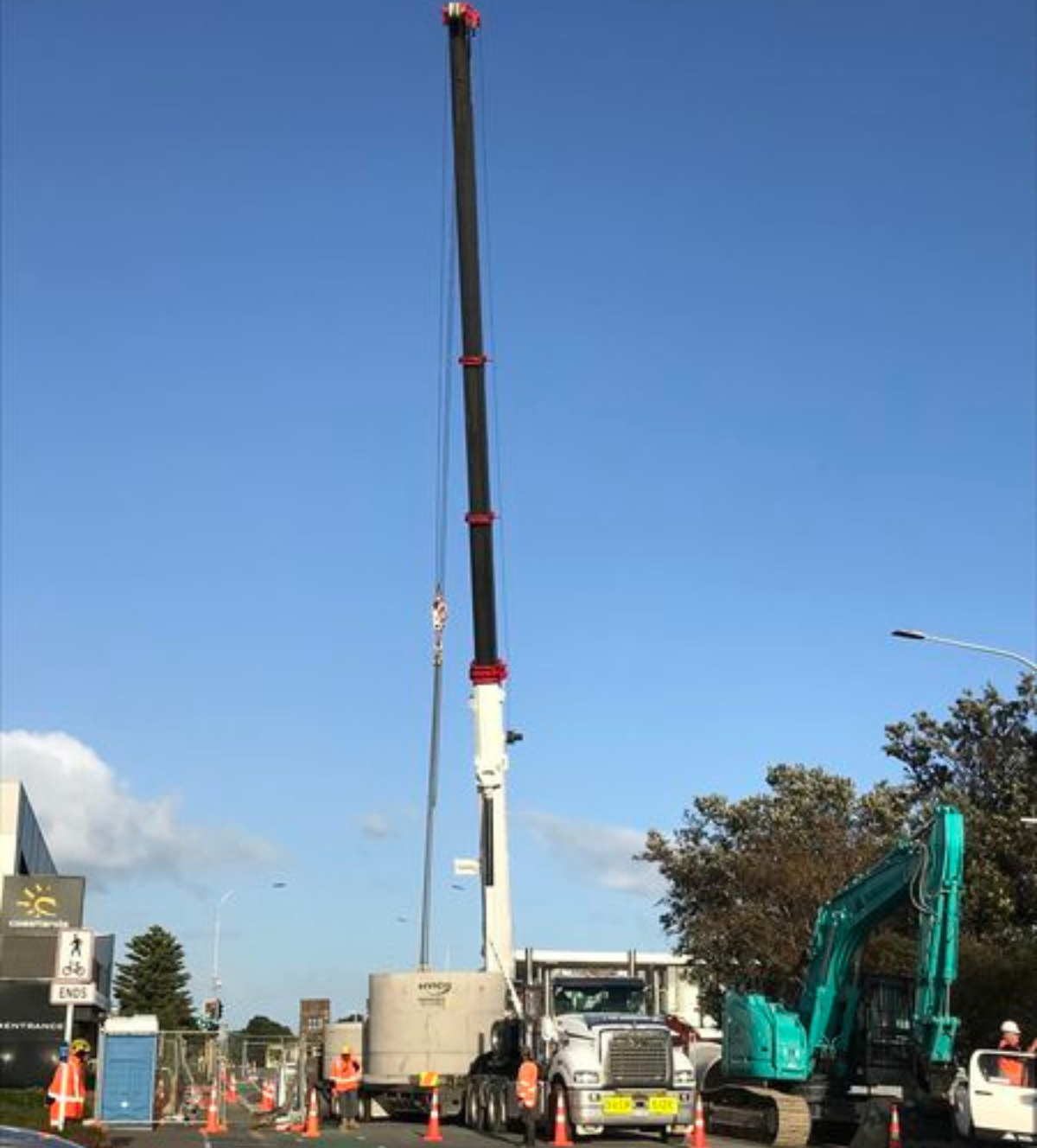 Craning large concrete stormwater pipes into place