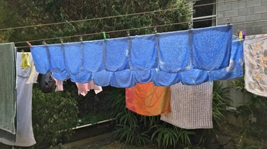 reusable cloths hanging on a washing line