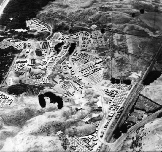 The Marine Camp at Paekākāriki during World War II. The Second Division of American Marines was based in the Paekakariki Camp near McKay's Crossing to train and recuperate, ca 1942. HP 104 C P Leonard Collection Kāpiti Coast District Libraries