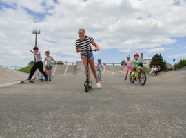 Playing together at Aōtaki Street Skatepark