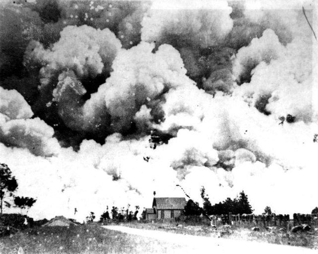 Fire in the Reikōrangi Valley in 1908. The church is St Andrew’s on the corner of Reikōrangi Rd and Akatarawa Rd. The fire burned from the ranges to the sea, the trains couldn’t run and the roads were closed Hp 2007, Wilf Wright Collection, KCD Libraries.