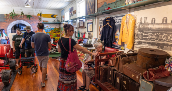 People explore the artifacts at Paekākāriki Station Museum