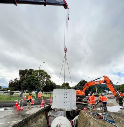 Stormwater pipe being craned into place at Iver Trask Place, Pararaparaumu
