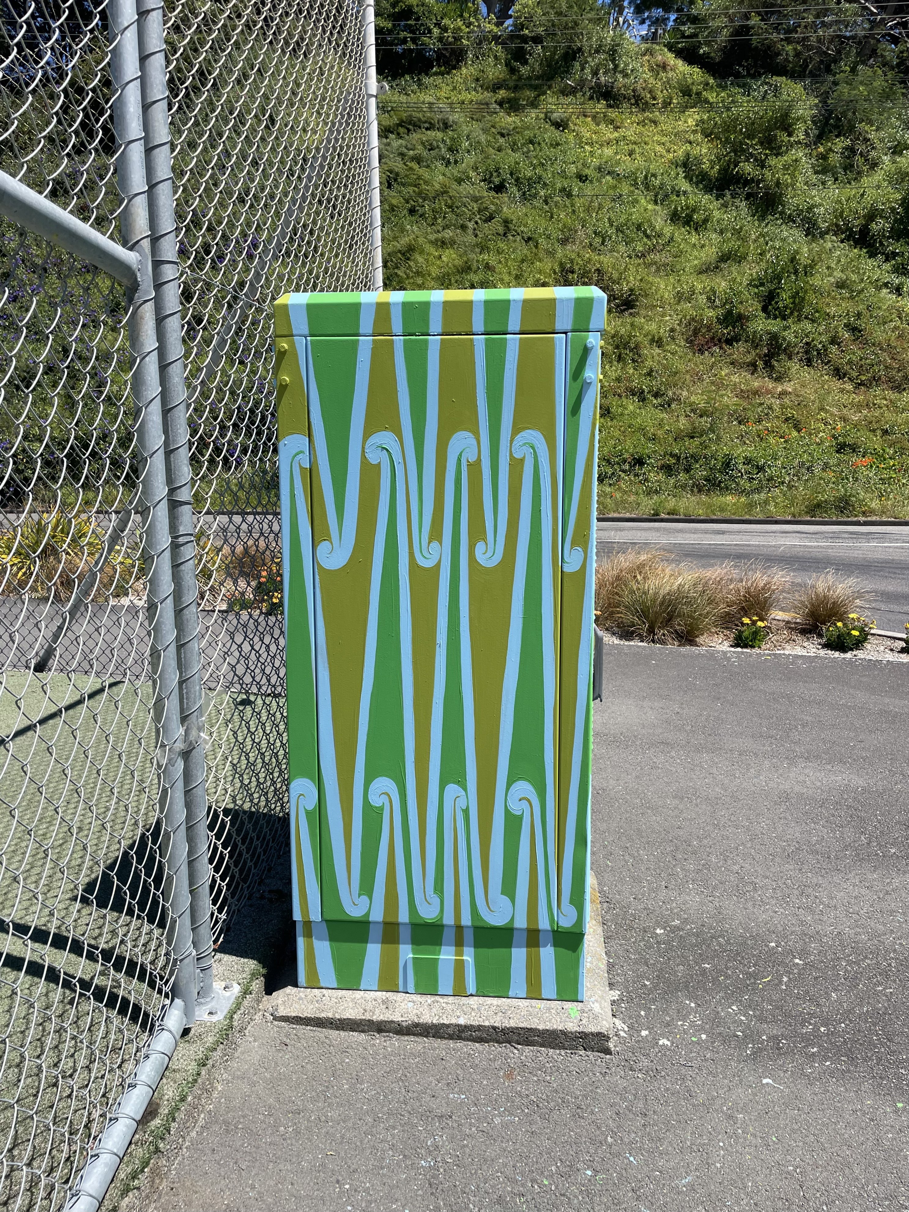 Side view of art cabinet 'Pūhoro', painted by Miriama Grace-Smith